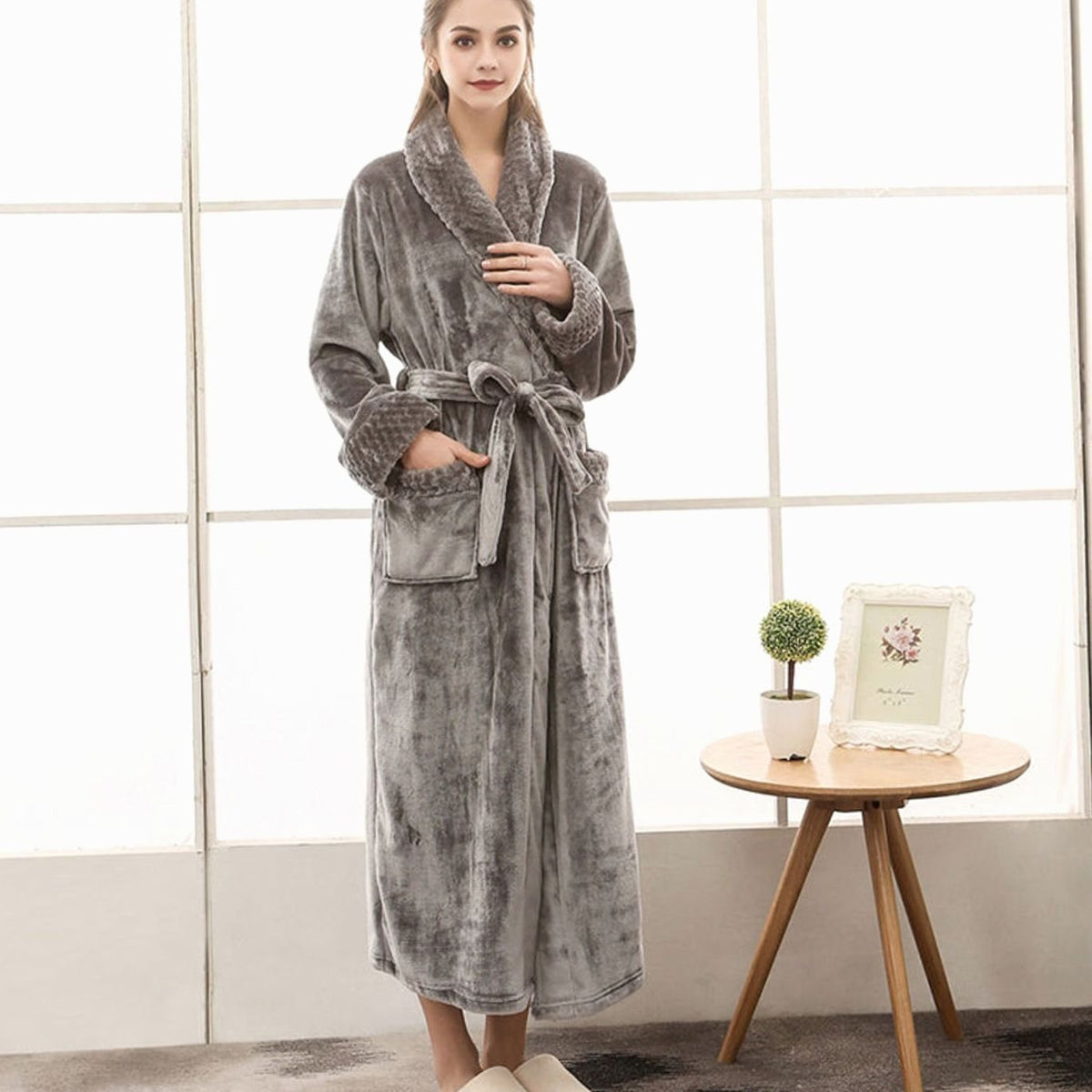 Women's long plush fleece lounge robe by Homixa with adjustable belt and two front pockets, cozy and comfortable for relaxing.