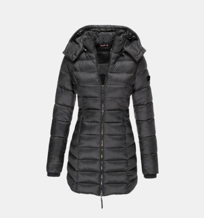 Women's long quilted winter puffer coat by Homixa with a removable hood and front zipper, designed for warmth and style.
