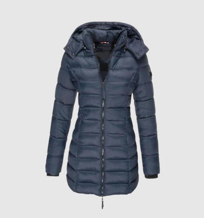 Women's long quilted winter puffer coat by Homixa with a removable hood and zip front, designed for warmth and style.