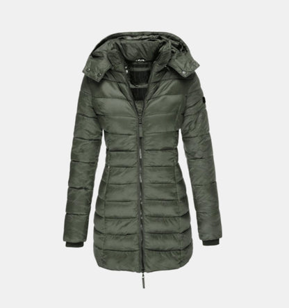 Women's long quilted winter puffer coat by Homixa featuring a removable hood and front zipper for warmth and style.