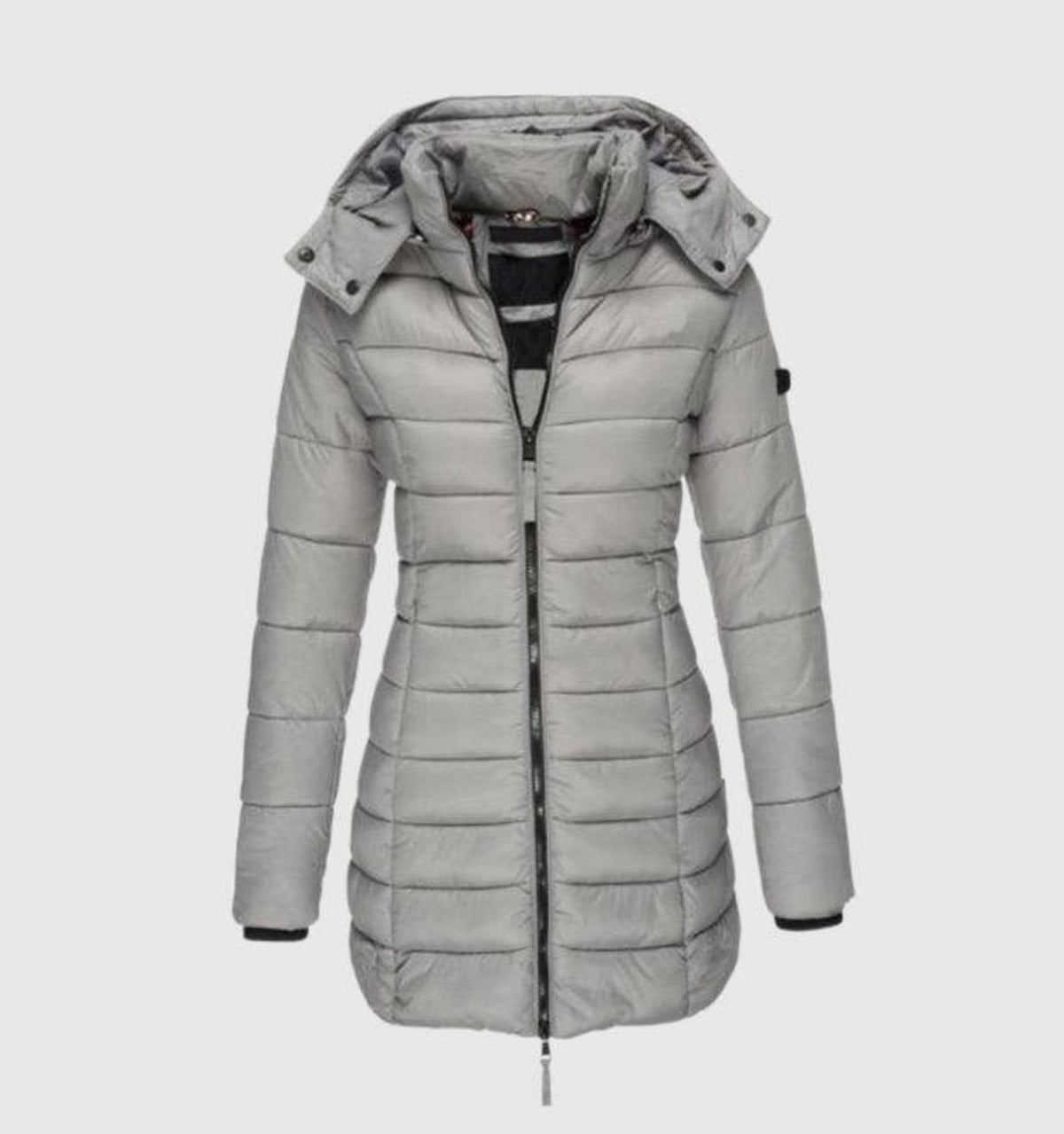 Women's long quilted winter puffer coat by Homixa with removable hood and zip front, designed for warmth and style.