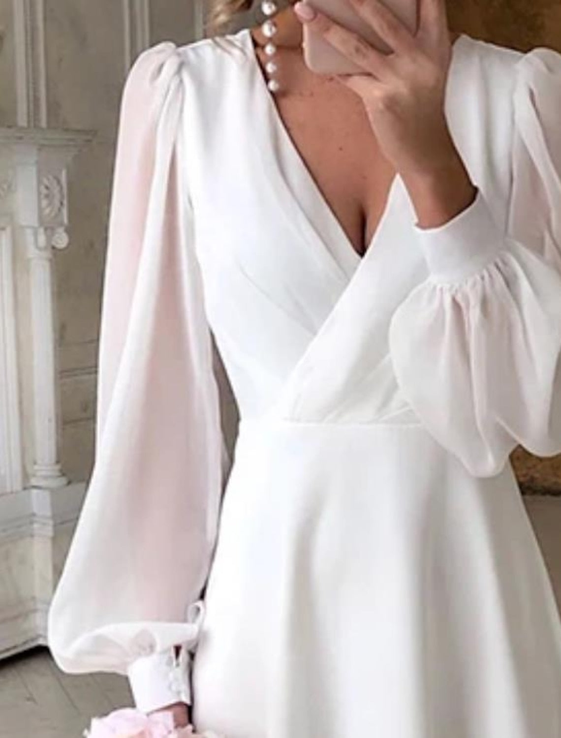 Homixa women's long-sleeve summer wedding guest dress with a gently flared silhouette, shown on a model.