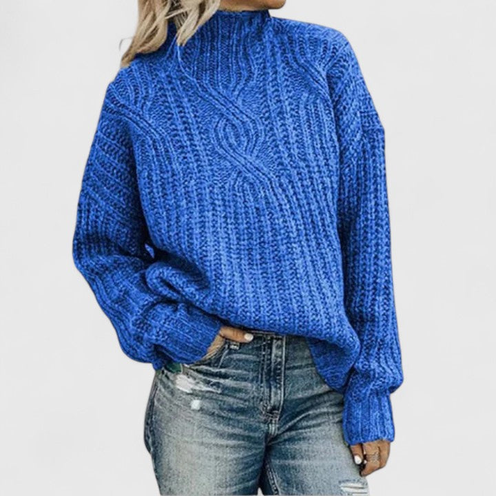 Homixa women's long-sleeve winter sweater with ribbed knit texture and classic fit, shown on a model.