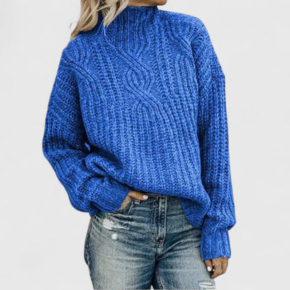 Homixa women's long-sleeve winter sweater with ribbed knit texture and classic fit, shown on a model.