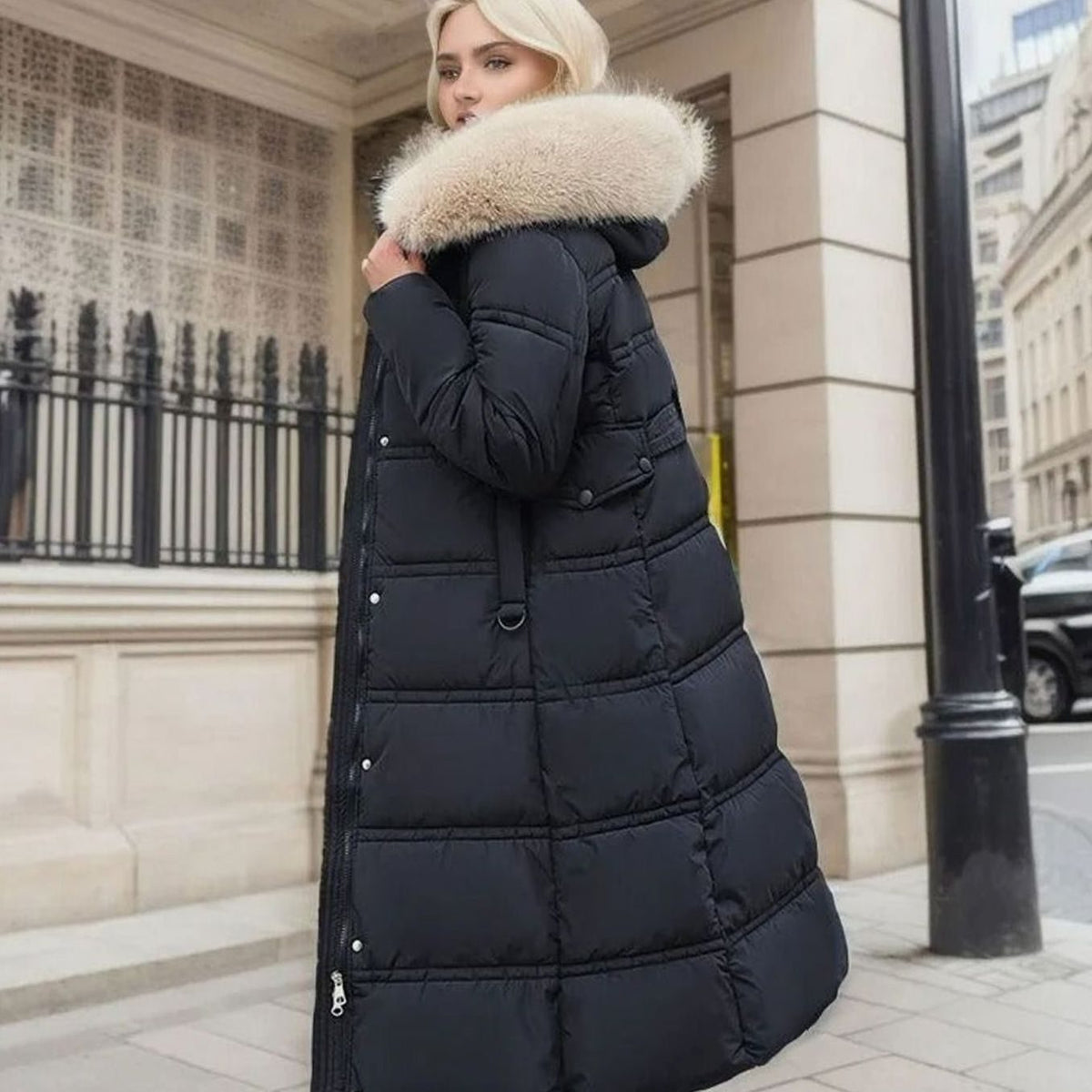 Women's longline quilted puffer parka by Homixa with plush-trimmed hood and zip front, designed for warmth and style.
