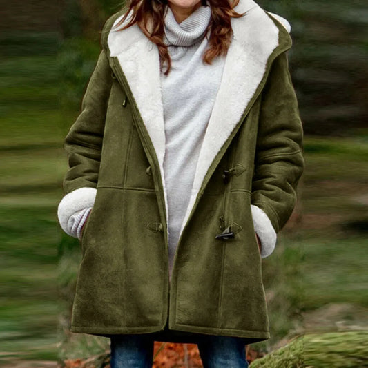 Women's longline Sherpa jacket by Homixa with toggle closures, plush collar, and side pockets, perfect for cozy winter style.