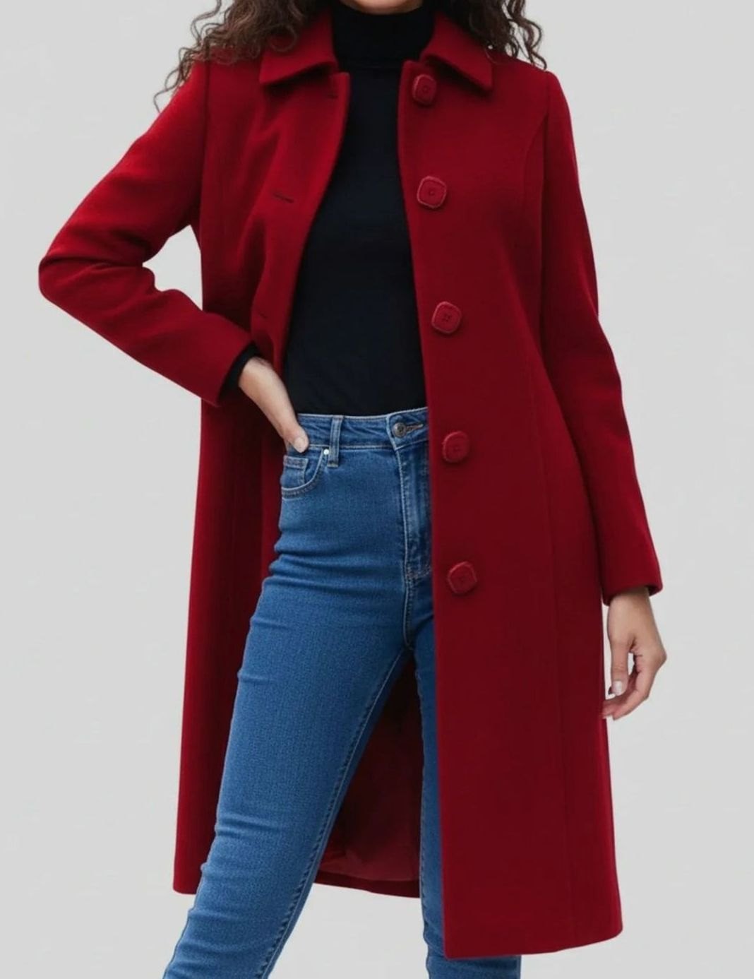 Women's longline winter coat by Homixa featuring a single-breasted design, button front, and below-knee hem.