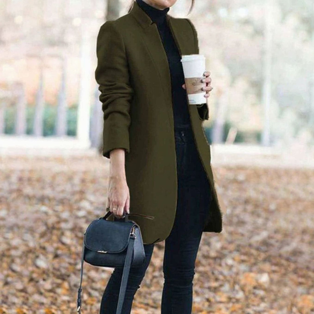 Women's longline winter jacket by Homixa with stand collar and slim, elegant silhouette, perfect for cold weather.