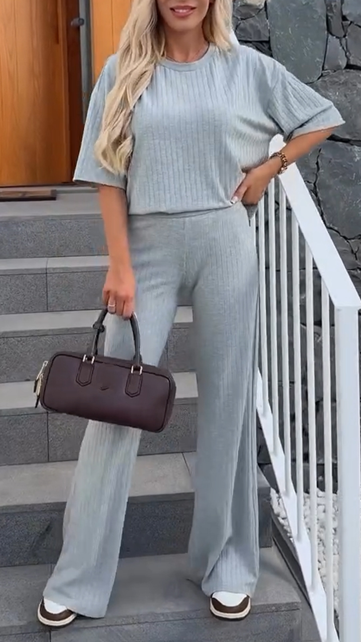 Homixa women's lounge two-piece set featuring a relaxed-fit top and straight-leg pants, perfect for comfortable casual wear.