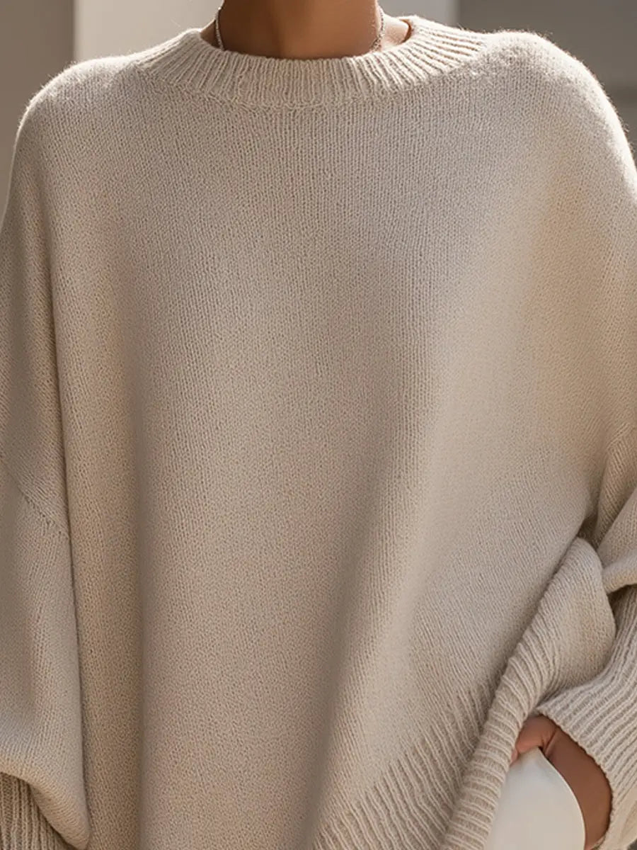 Women’s oversized batwing-sleeve knit sweater by Homixa with flowing drape and soft, cozy fabric.