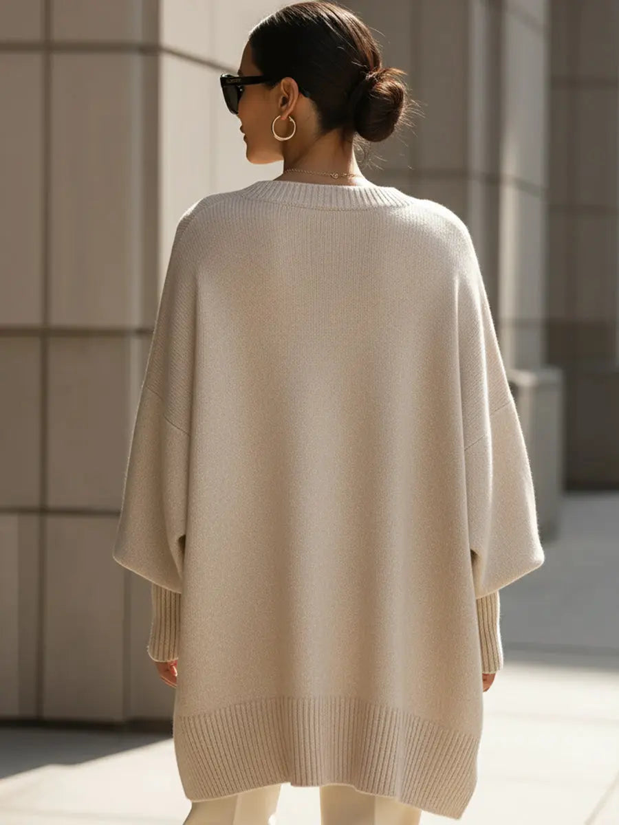 Women's oversized batwing-sleeve knit sweater by Homixa with flowing drape and soft, cozy fabric.