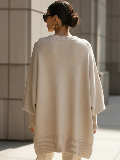 Women's oversized batwing-sleeve knit sweater by Homixa with flowing drape and soft, cozy fabric.