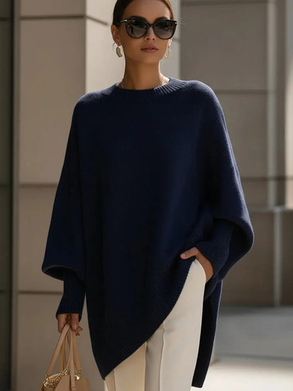 Women's oversized batwing-sleeve knit sweater by Homixa, featuring a flowing drape and soft, cozy fabric.