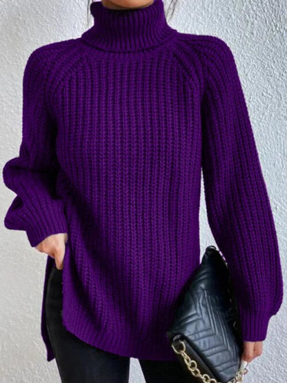 Women’s oversized chunky-knit turtleneck sweater by Homixa with wide ribbed cuffs, soft and cozy for cold weather.