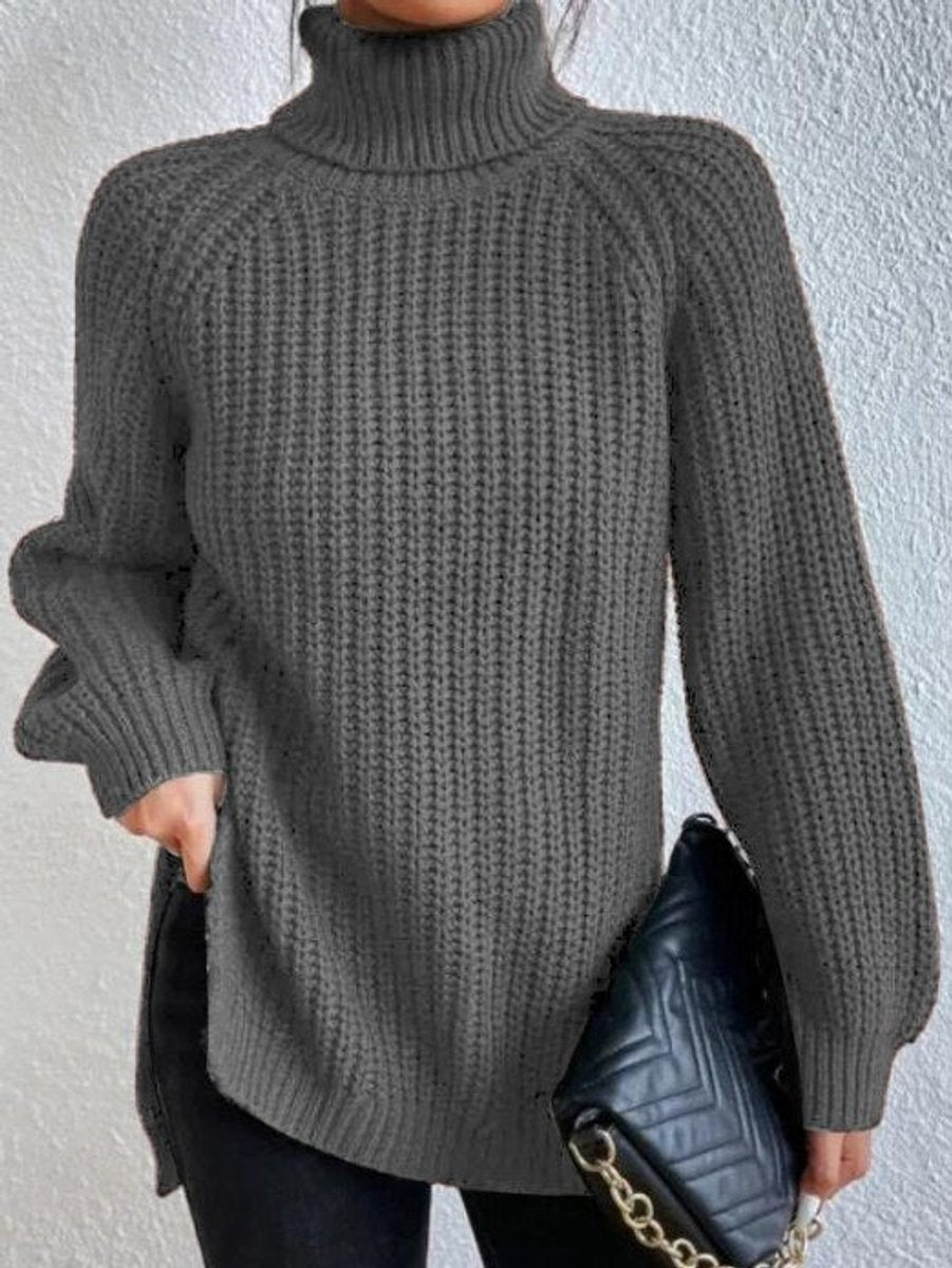 Women’s oversized chunky-knit turtleneck sweater with wide ribbed cuffs, in cozy beige, by Homixa.