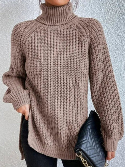 Women's oversized chunky-knit turtleneck sweater by Homixa featuring wide ribbed cuffs and a cozy, relaxed fit.