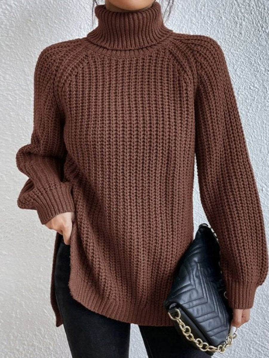 Women's oversized chunky-knit turtleneck sweater with wide ribbed cuffs, in cozy knit fabric, by Homixa.