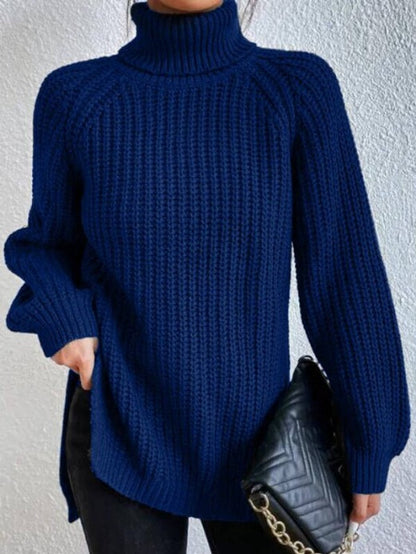 Women’s oversized chunky-knit turtleneck sweater by Homixa with wide ribbed cuffs, cozy and stylish winter sweater.