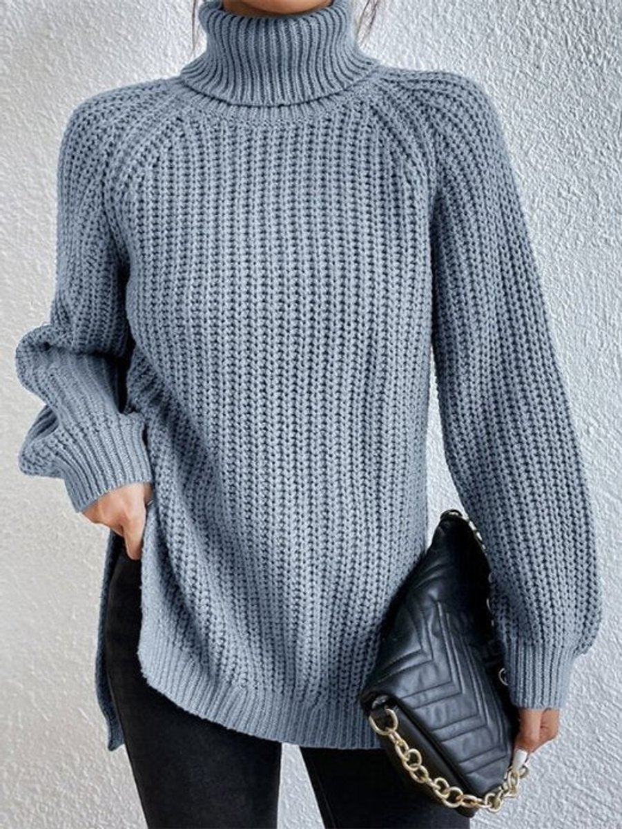 Women's oversized chunky-knit turtleneck sweater with wide ribbed cuffs, beige Homixa sweater, cozy and stylish winter knitwear.