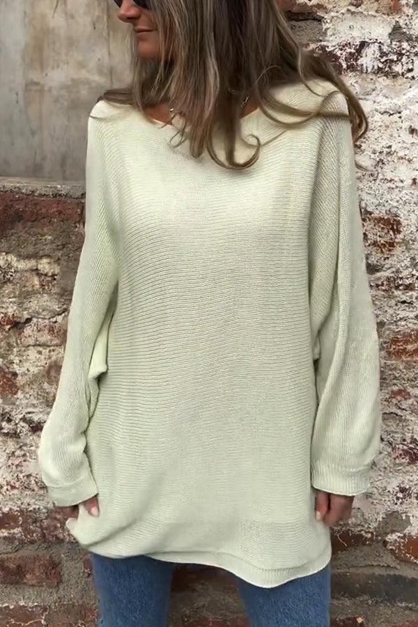 Women’s oversized crew-neck sweater by Homixa with cutout sleeves and button details, casual and stylish for everyday wear.