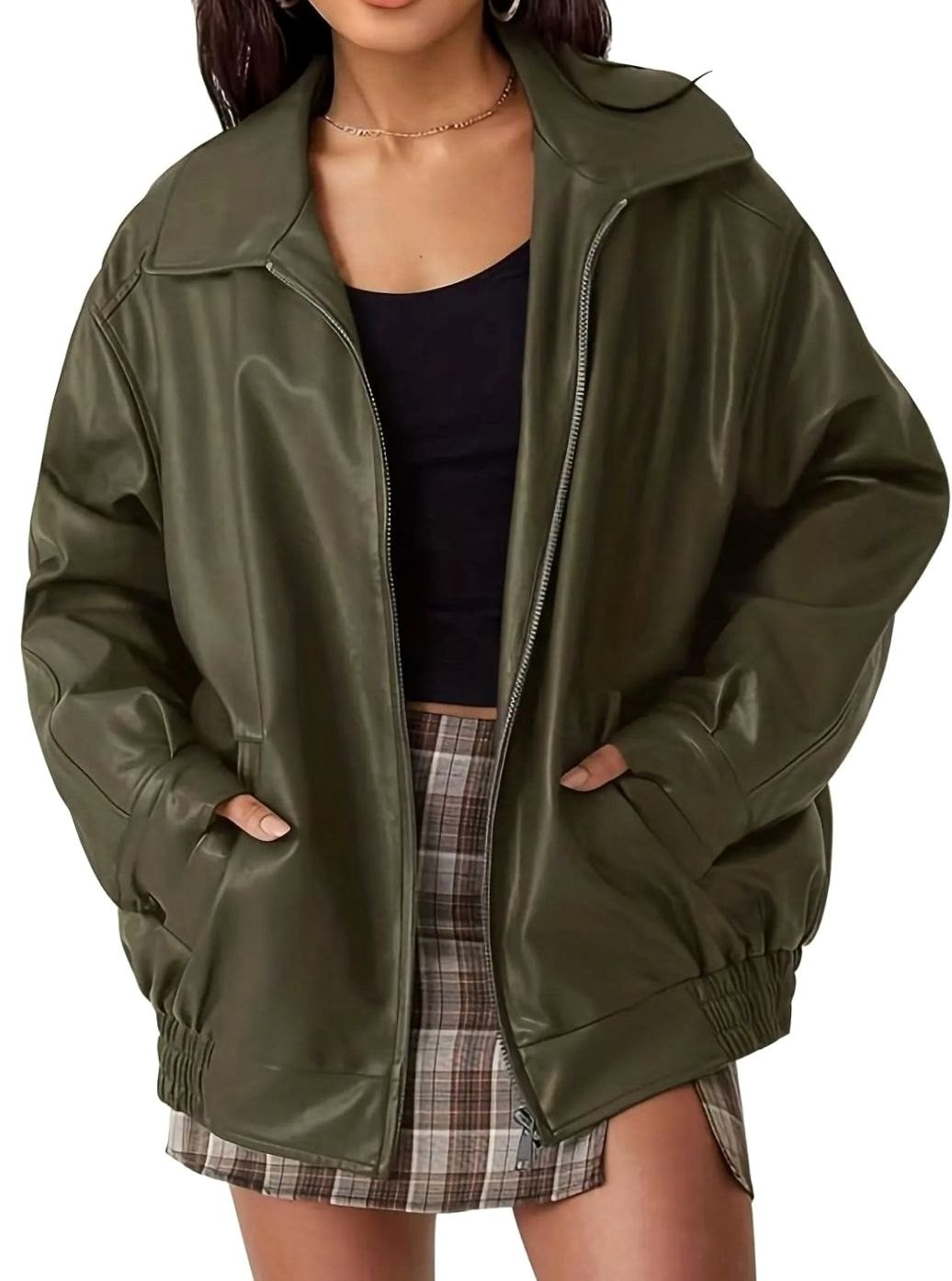 Women's oversized faux-leather bomber jacket by Homixa with side pockets, elastic hem, and pointed collar, shown on a model.