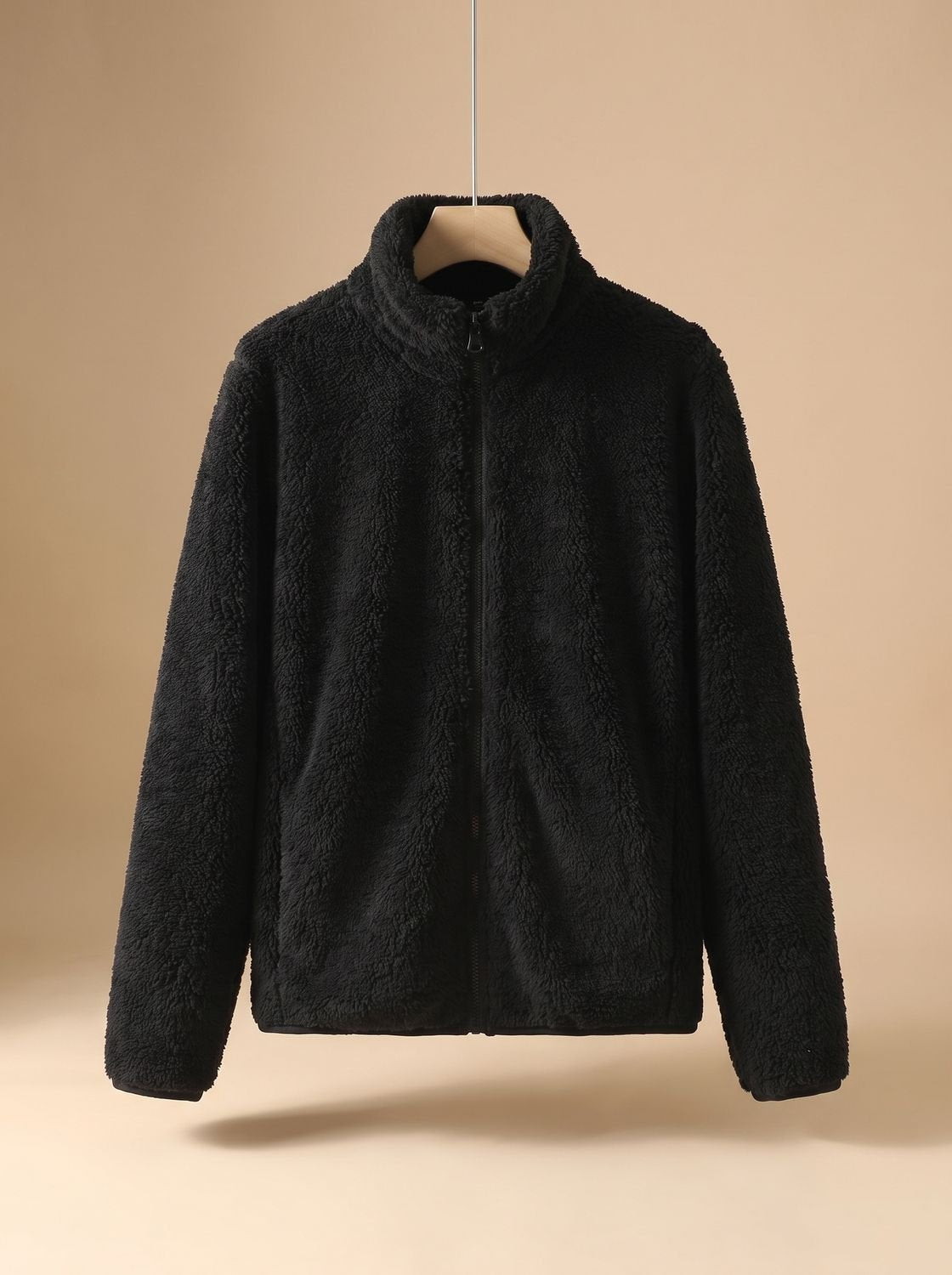 Women's oversized fleece jacket by Homixa with stand collar, zip front, and soft plush interior for cozy warmth.