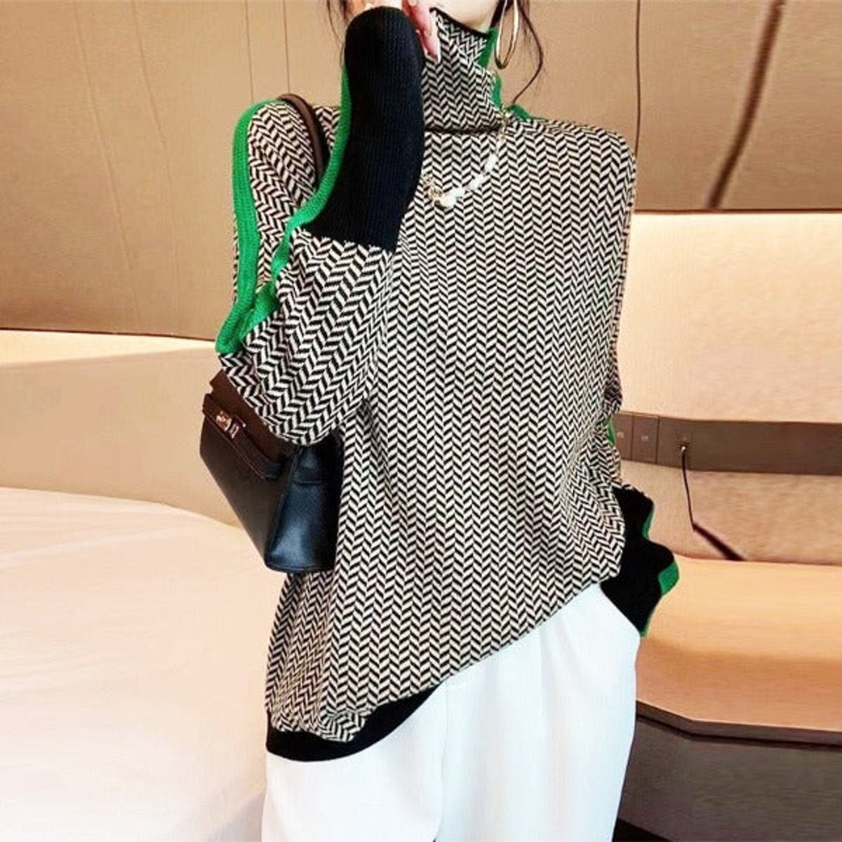 Women’s oversized herringbone turtleneck sweater with contrast stitching, featuring a cozy fit and stylish design by Homixa.