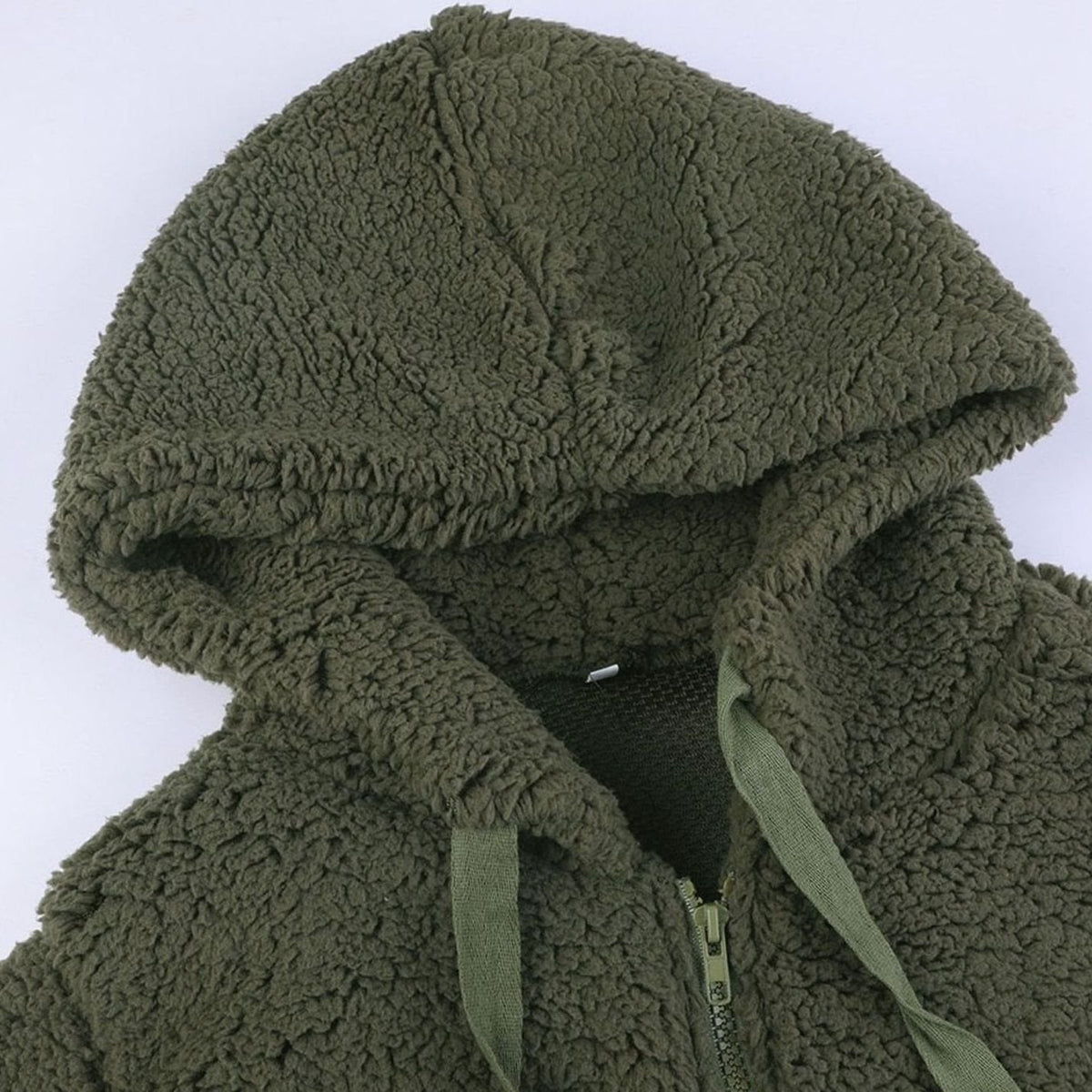Women's oversized Teddy coat by Homixa featuring textured faux-fur fabric, hood, and full zipper, perfect for cozy winter style.