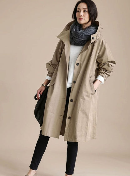 Women's oversized hooded trench coat by Homixa, midlength cut with Korean-inspired design, featuring a stylish and comfortable fit.