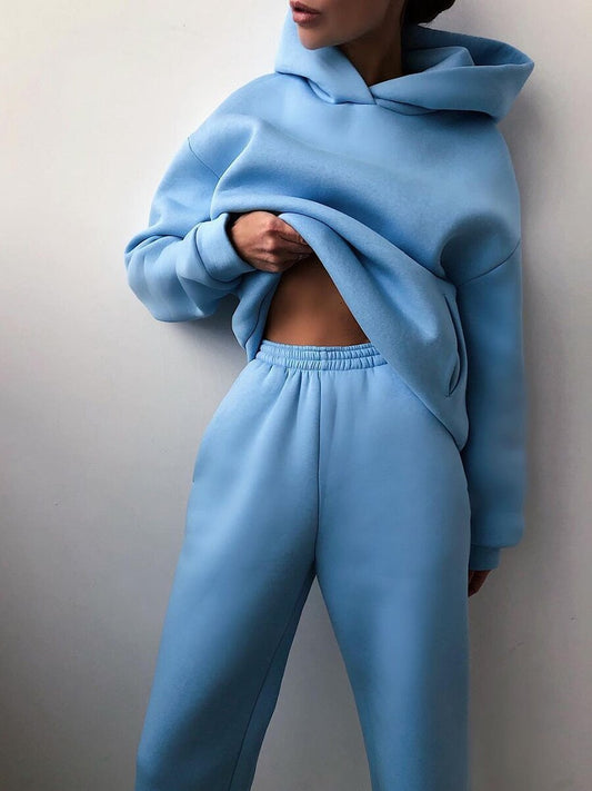 Homixa women's oversized knit hoodie and jogger set with elastic waist and soft fleece, showing cozy, relaxed fit and comfortable fabric.