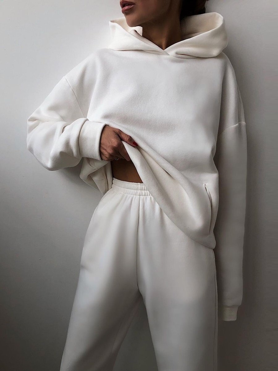 Homixa women's oversized knit hoodie and jogger set with elastic waist and soft fleece fabric, perfect for cozy casual wear.
