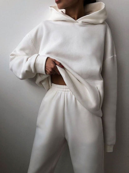 Homixa women's oversized knit tracksuit set featuring a hooded sweater and matching jogger pants, perfect for casual wear.