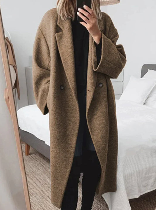 Women’s oversized wool coat with turn-down collar and deep patch pockets, by Homixa, perfect for stylish winter layering.