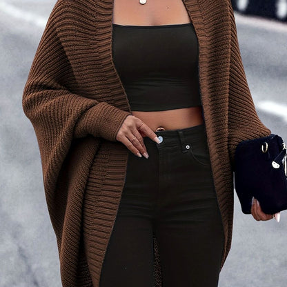 Women's oversized open-front cardigan by Homixa with longline cut and batwing sleeves, styled casually on a model.