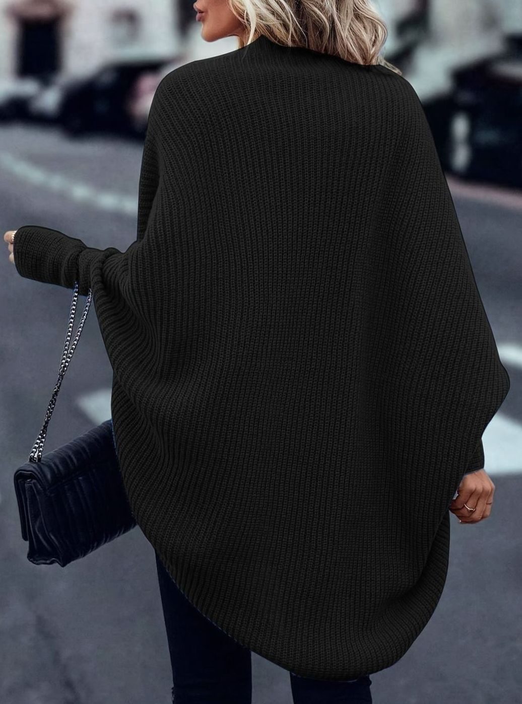 Women’s oversized open-front cardigan by Homixa featuring longline cut and batwing sleeves, styled for a relaxed, cozy look.