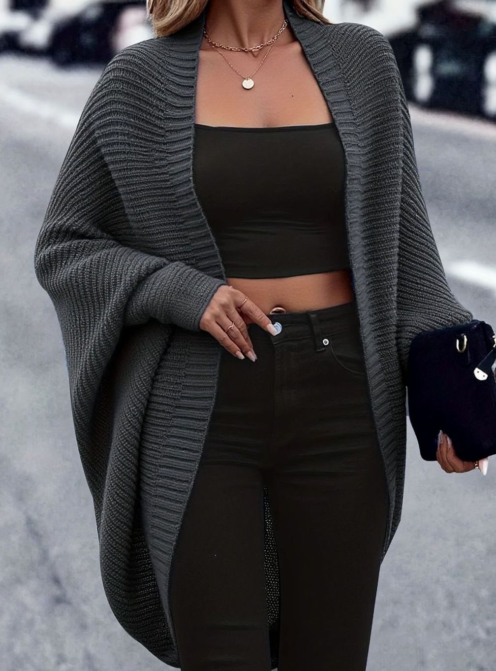Women's oversized open-front cardigan with longline cut and batwing sleeves by Homixa, displayed draped on a model.