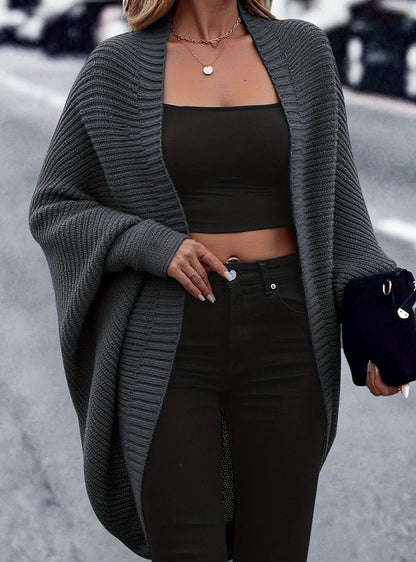 Women's oversized open-front cardigan with longline cut and batwing sleeves by Homixa, displayed draped on a model.