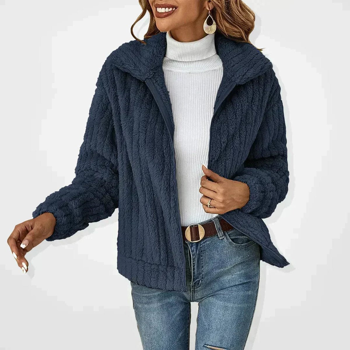 Women's oversized quilted fleece coat by Homixa with zip-up front, ribbed cuffs, and spread collar, shown on a model.