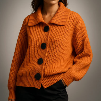 Women's oversized ribbed knit cardigan by Homixa featuring a wide collar and large black buttons, styled casually.