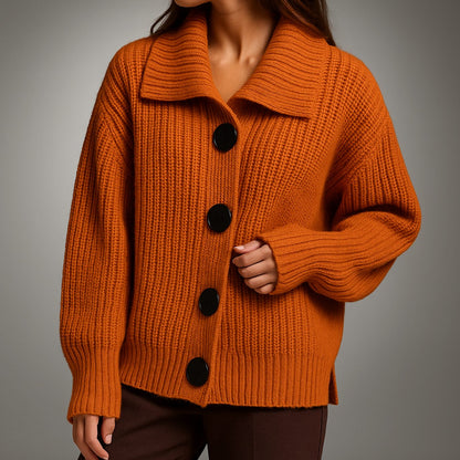 Women's oversized ribbed knit cardigan by Homixa featuring a wide collar and large black buttons, displayed on a neutral background.