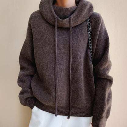 Women's oversized soft-knit sweater with hood and adjustable drawstring, cozy and stylish by Homixa.
