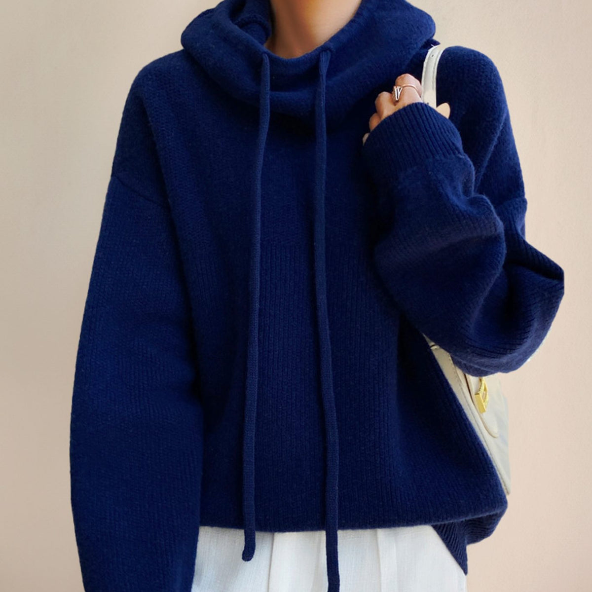 Homixa women's oversized soft-knit sweater with hood and adjustable drawstring, featuring a cozy, relaxed fit and casual style.