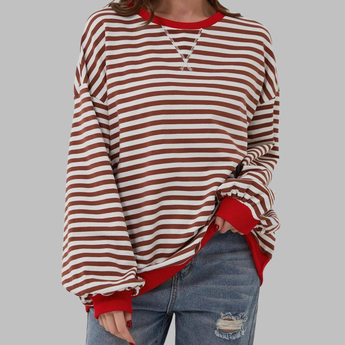 Women’s oversized striped sweatshirt by Homixa featuring contrast ribbed cuffs and collar, casual and comfortable fit.