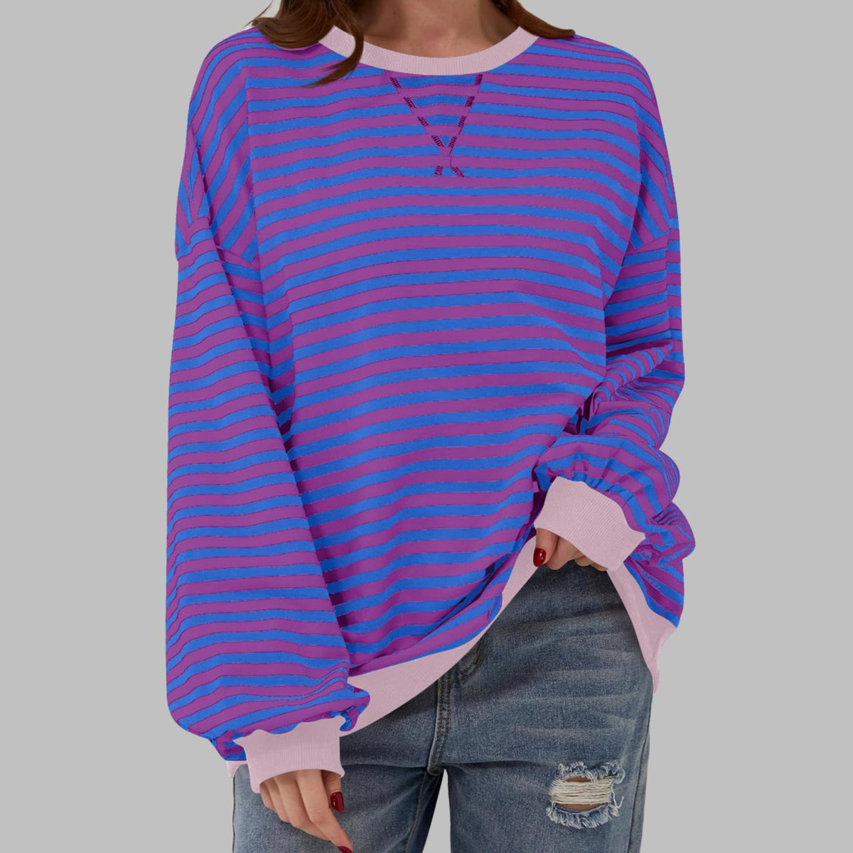 Women's oversized striped sweatshirt by Homixa featuring contrast ribbed cuffs and collar, casual and comfortable fashion piece.