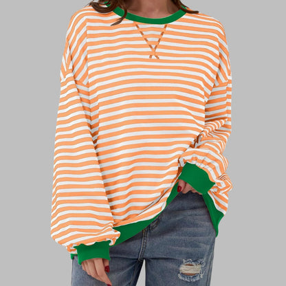 Women's oversized striped sweatshirt by Homixa featuring contrast ribbed cuffs and collar, soft fabric and relaxed fit.