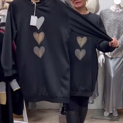 Women's oversized sweatshirt dress by Homixa featuring a stacked heart graphic and ribbed hem, casual and cozy fashion.