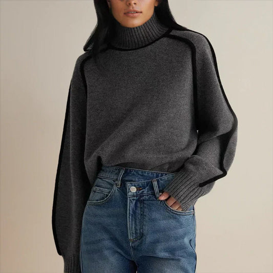 Women's oversized two-tone knit turtleneck sweater with raglan sleeves by Homixa, featuring a cozy, stylish design.