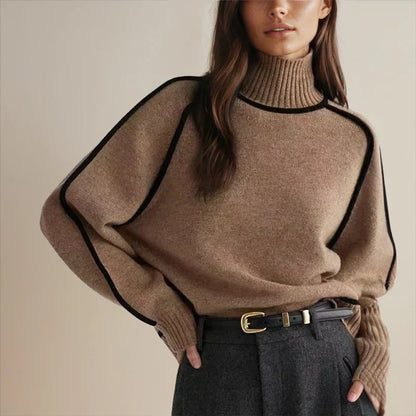 Women’s oversized two-tone knit turtleneck sweater with raglan sleeves by Homixa, showing the relaxed fit and stylish design.