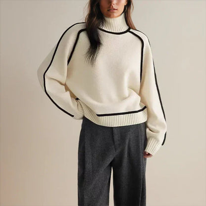 Women's oversized two-tone knit turtleneck sweater with raglan sleeves by Homixa, featuring a cozy, stylish design.