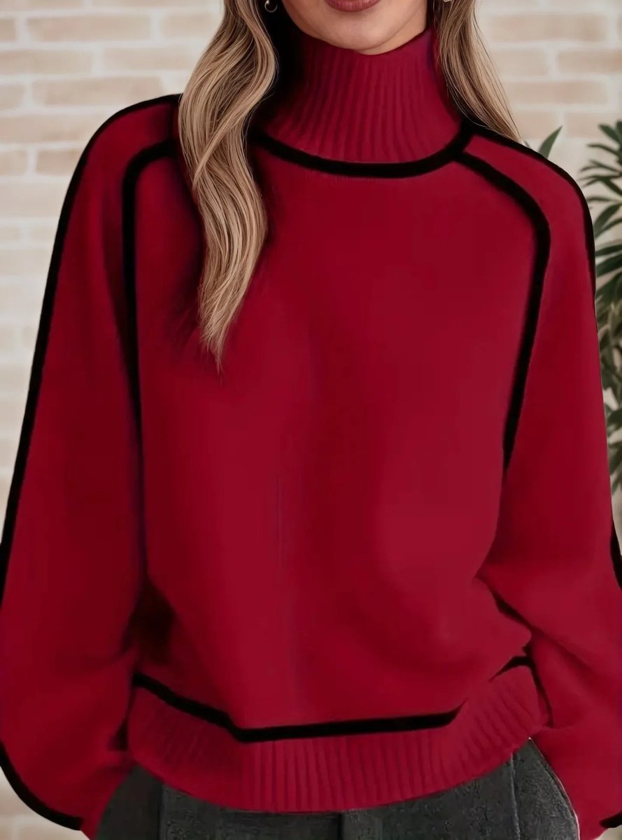 Women's oversized two-tone knit turtleneck sweater with raglan sleeves by Homixa, showing the cozy, stylish design in natural pose.